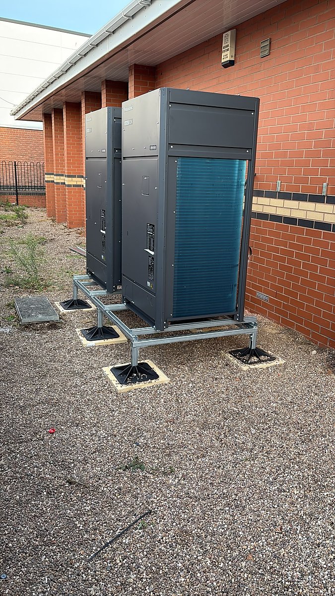 Commercial air conditioning units installed on a steel frame